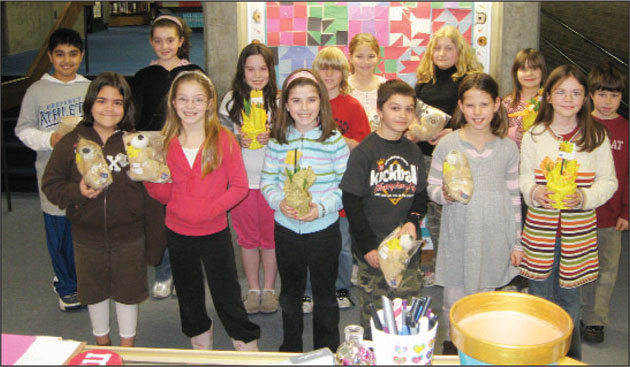 Students at Hill-Roberts deliver hundreds of daffodils.